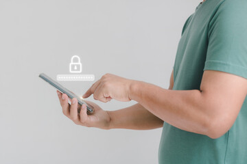 Wall Mural - Business Technology security concept. A man using a smart mobile phone to access on phone for validating passwords for biometric two steps authentication to unlock security.