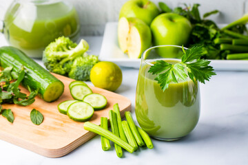 Canvas Print - A glass of green celery juice. Celery drink prepared for healthy nutrition and detox.