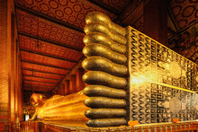 Golden Reclining Buddha Statue At Wat Pho In Bangkok Thailand