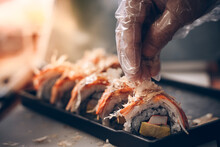Chef Is Making Sushi To Serve Customers. Sushi Is A Street Food Of Japan And New Business In The World.
