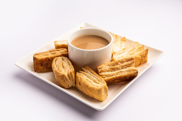 Wall Mural - Khari puff biscuit or Kharee Puff pastry is an evergreen accompaniment with chai, Indian snack