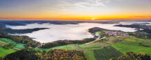 Germany, Baden-Wurttemberg, Drone Panorama Of Wieslauftal Valley At Foggy Autumn Sunrise