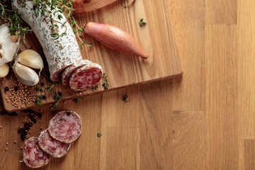 Wall Mural - Traditional dry-cured sausage with thyme, garlic, onion, and spices.