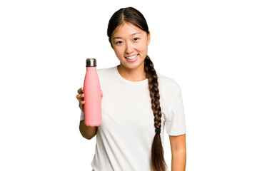 Wall Mural - Young asian woman holding a pink thermo isolated happy, smiling and cheerful.