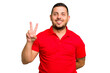 © Asier - Young caucasian man isolated showing victory sign and smiling broadly.