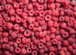 natural fruit background of fresh raspberries top view, texture of berries
