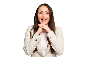 Wall Mural - Young caucasian woman isolated on green chroma background praying for luck, amazed and opening mouth looking to front.