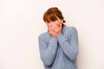 Wall Mural - Middle age caucasian woman isolated on white background laughing about something, covering mouth with hands.