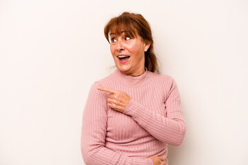 Wall Mural - Middle age caucasian woman isolated on white background looks aside smiling, cheerful and pleasant.