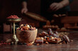 © Igor Normann - Various dried fruits and nuts on a kitchen table.