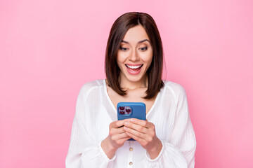 Wall Mural - photo of astonished cute lady use modern device gadget choose low price clothes online boutique purc
