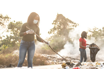 Wall Mural - black women cleaning up a dirty place