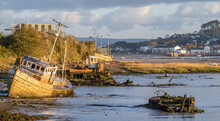 Ships, Wrecks Of Boat On River Torridge Estuary Near Appledore, Devon In Morning Light.