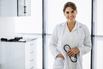 Wall Mural - Portrait of woman doctor with stethoscope