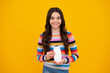 © Olena - Teenage girl with shampoos conditioners or shower gel. Kids hair care cosmetic product, shampoo bottle. Happy teenager, positive and smiling emotions of teen girl.