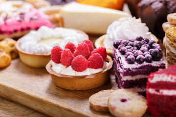 Sweet dessert. Various piece of cakes, muffins and cookies