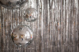 Fototapeta Kwiaty - Festive background. Many disco ball on silver background. Christmas. Wedding. Birthday