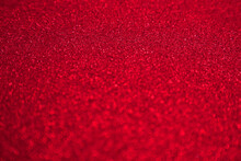 Shiny Red Black Blurred Background For Holiday Design. Christmas Abstract Sparkles, Selective Focus