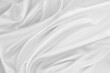 Leinwandbild Motiv Rippled white silk fabric texture background
