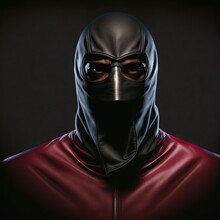 Fetish Portrait. Man In Black Mask And Red Latex Suit. BDSM Style. 