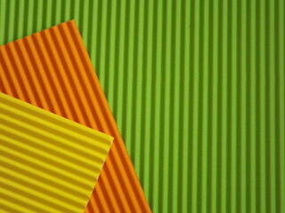 Sticker - The corrugated surface is multicolored with parallel lines as a background black blue orange crimson pink light green orange and purple