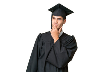 Young university graduate caucasian man over isolated background having doubts and with confuse face expression