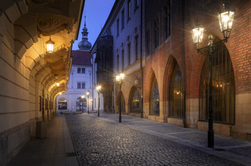 night street near the carolinum - historical building of charles university in prague at night with 