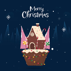 Wall Mural - Christmas Cupcake Decorated By Chimney House, Tree, Candies And Lighting Garland Against Blue Snowfall Background. Merry Christmas Greeting Card.