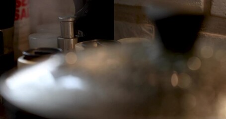 Sticker - Lid on frying pan with steam escaping on gas stove