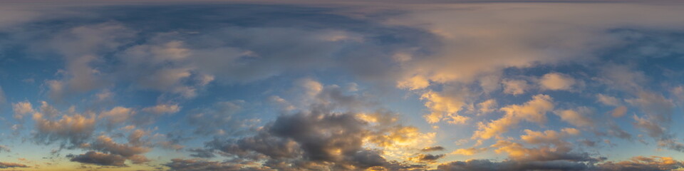 Wall Mural - dark blue sunset sky panorama with golden cumulus clouds. seamless hdr 360 panorama in spherical equ