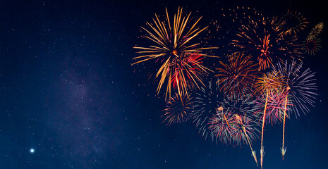Wall Mural - fireworks with blur milky way background