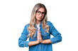 © luismolinero - Young Uruguayan woman over isolated background keeps palm together. Person asks for something