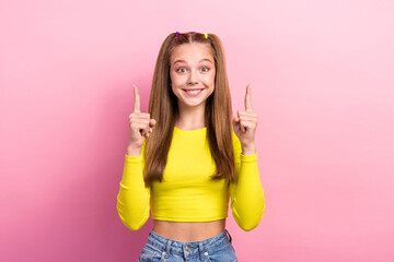 Wall Mural - Photo of cheerful cute girlfriend two arm direct empty space offer discount novelty recommend proposition isolated on pink color background