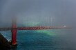 Breathtaking aerial view of dark clouds covering the Golden Gate Bridge in San Francisco, California