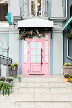View On Entrance Of Building With Pink Door