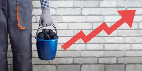 Wall Mural - Man worker with bucket of coal and growth chart. concept of increase production price export import coal.