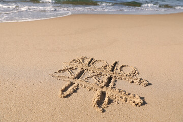 Canvas Print - Tic tac toe game drawn on sand near sea, space for text