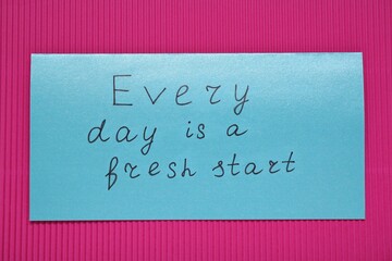 Wall Mural - Card with phrase Every Day Is A Fresh Start on pink background, top view. Motivational quote