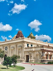 Wall Mural - Vertical shot of historic Karya Siddhi Hanuman Hindu Temple on a sunny day