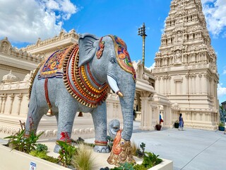 Wall Mural - Vertical shot of an elephant statue at historic Karya Siddhi Hanuman Hindu Temple on a sunny day