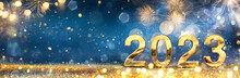 2023 New Year Celebration - Golden Number And Fireworks At Blue Eve Night In Abstract Defocused Lights