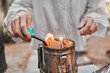 © Beaunitta V W/peopleimages.com - Hands, fire and beekeeping with a woman farmer using a smoker in the production of honey in the countryside. Agriculture, farm and sustainability with a female beekeeper working with a fogging tool