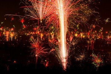 Sticker - Beautiful view of vibrant fireworks exploding in the air during New Year in Freiburg im Breisgau