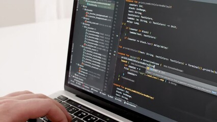 Wall Mural - coding on the screen, html encoding and programming on a laptop screen, developer, web development. 