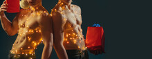 New Year Strip And Gifts For Adults. Call Boys Or Sexy Athlete Men At X-mas. Sexy Muscular Men. Concept Of The Twins. Two Twin Brothers With Bare Naked Body Torso.