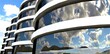 Cloudy sky, sea and rocks are reflected in the glass facade of a fashionable luxury hotel in the future. 3d rendering.