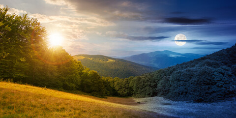 Wall Mural - stunning mountain landscape in summer at daybreak. day and night time change concept. forested hills
