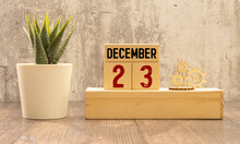 December 23. Number Cube In Natural Concept On Leather For The Background