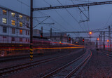 Fototapeta Pomosty - View on Prague Liben railway station in rainy evening