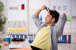 © Elnur - Young male freelancer working from home
